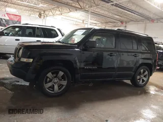2014 Jeep Patriot High Altitude with VIN 1C4NJPFAXED679271, listed as a IAAI auction lot 41290600 with 157,256 mi miles and . Bid and sale history available at carsss.com. Image 14.