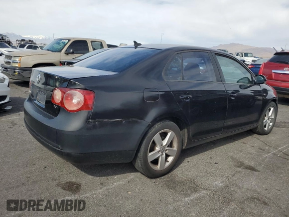 2010 Volkswagen Jetta Wolfsburg Edition with VIN 3VWRJ7AJ1AM050728, listed as a Copart auction lot 49259105 with 161,034 mi miles and Salvage title. Bid and sale history available at DreamBid. Image 3.