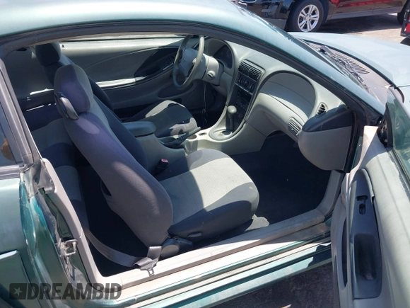 2001 Ford Mustang Standard z VIN 1FAFP404X1F217978, wystawiony jako IAAI lot #42569548 z przebiegiem 199 730 mil mil oraz . Historia ofert i sprzedaży dostępna na DreamBid. Obrazek 5.
