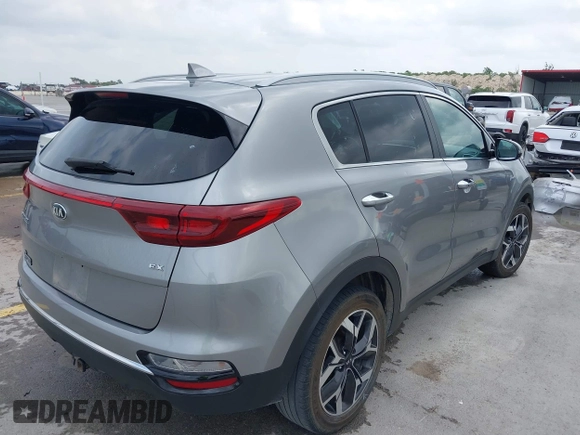 2020 Kia Sportage EX with VIN KNDPNCAC2L7791248, listed as a IAAI auction lot 42104819 with 73,324 mi miles and . Bid and sale history available at DreamBid. Image 4.