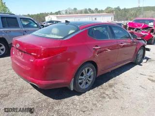 2011 Kia Optima EX with VIN KNAGN4A74B5109910, listed as a IAAI auction lot 41856472 with 212,227 mi miles. Bid and sale history available at carsss.com. Image 4.