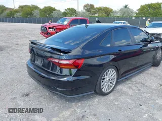 2019 Volkswagen Jetta GLI S with VIN 3VW5T7BU9KM142379, listed as a IAAI auction lot 42056617 with 77,283 mi miles and . Bid and sale history available at DreamBid. Image 4.