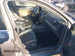 2007 Volkswagen Jetta z VIN 3VWJF71K97M021624, wystawiony jako IAAI lot #41682214 z przebiegiem Nie podano mil oraz . Historia ofert i sprzedaży dostępna na DreamBid. Obrazek 5.