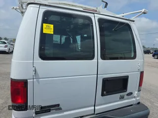 2014 Ford Econoline Cargo Commercial with VIN 1FTNE1EW3EDA67962, listed as a IAAI auction lot 42737706 with 108,158 mi miles and . Bid and sale history available at DreamBid. Image 13.