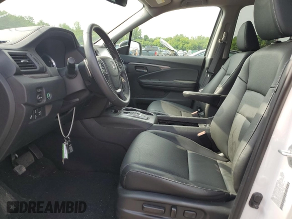 2023 Honda Ridgeline RTL with VIN 5FPYK3F53PB067003, listed as a Copart auction lot 58384895 with 31,983 mi miles and Salvage title. Bid and sale history available at DreamBid. Image 7.
