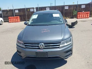 2019 Volkswagen Tiguan SE with VIN 3VV2B7AX3KM143968, listed as a IAAI auction lot 39838788 with 155,823 mi miles and . Bid and sale history available at DreamBid. Image 12.