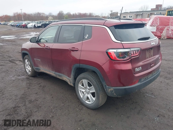 2022 Jeep Compass Latitude with VIN 3C4NJDBB7NT206323, listed as a IAAI auction lot 42038930 with 84,976 mi miles and . Bid and sale history available at DreamBid. Image 3.