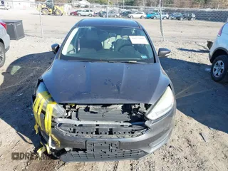 2015 Ford Focus SE with VIN 1FADP3F26FL280298, listed as a IAAI auction lot 40852000 with 144,805 mi miles and . Bid and sale history available at DreamBid. Image 12.