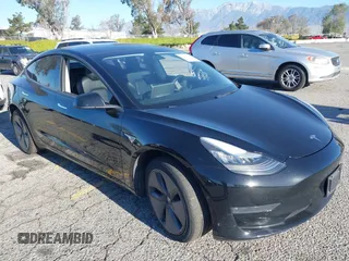 2019 Tesla Model 3 Mid Range z VIN 5YJ3E1EA7KF398365, wystawiony jako IAAI lot #41818649 z przebiegiem 105 673 mil mil oraz . Historia ofert i sprzedaży dostępna na DreamBid. Obrazek 1.