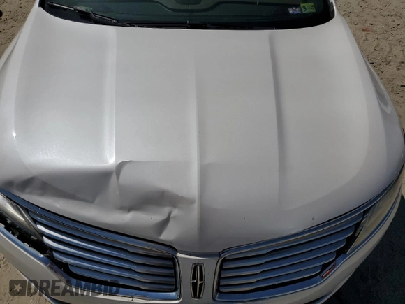 2015 Lincoln MKC z VIN 5LMCJ1A94FUJ47221, wystawiony jako Copart lot #55670615 z przebiegiem 143 926 mil mil oraz Szkody całkowita. Historia ofert i sprzedaży dostępna na DreamBid. Obrazek 12.