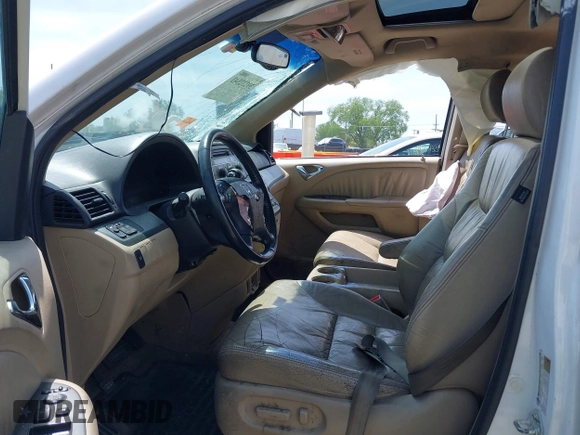 2007 Honda Odyssey EX-L with VIN 5FNRL38617B141003, listed as a IAAI auction lot 39232543 with 195,096 mi miles and . Bid and sale history available at DreamBid. Image 5.