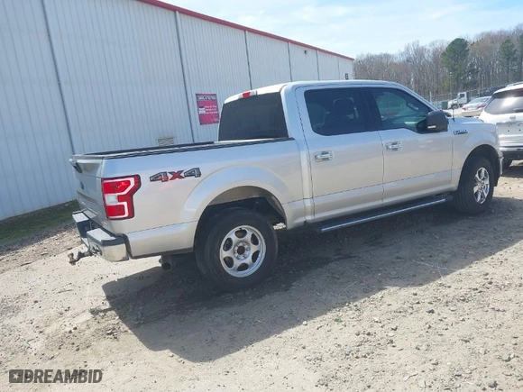 2018 Ford F-150 XL with VIN 1FTEW1EG2JFE36699, listed as a IAAI auction lot 41842524 with 152,813 mi miles. Bid and sale history available at carsss.com. Image 4.