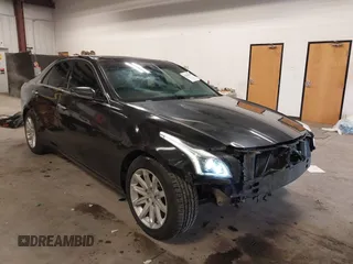 2014 Cadillac CTS Luxury AWD with VIN 1G6AX5S36E0173682, listed as a IAAI auction lot 41538709 with 102,772 mi miles and . Bid and sale history available at DreamBid. Image 1.