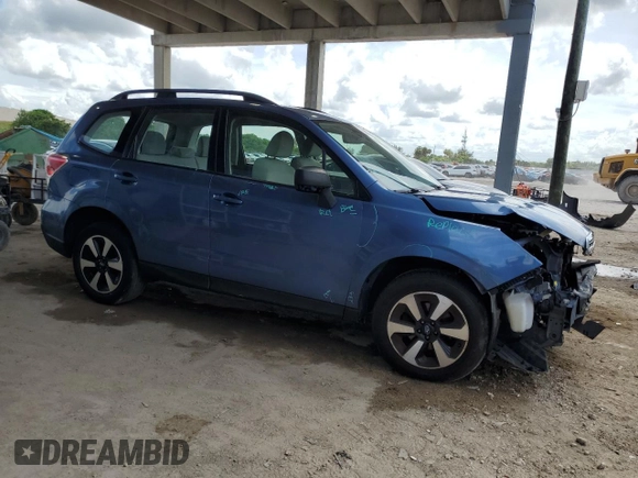 2017 Subaru Forester with VIN JF2SJABC2HH581258, listed as a Copart auction lot 60853875 with 62,787 mi miles and Salvage title. Bid and sale history available at DreamBid. Image 4.
