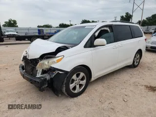 2015 Toyota Sienna LE AAS with VIN 5TDKK3DC6FS570129, listed as a Copart auction lot 63242945 with 196,974 mi miles and Salvage title. Bid and sale history available at DreamBid. Image 1.