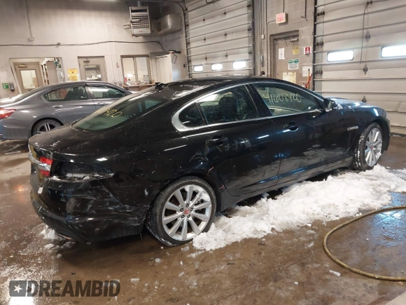 2014 Jaguar XF V6 SC with VIN SAJWJ0EF2E8U13746, listed as a IAAI auction lot 41608420 with 141,476 mi miles. Bid and sale history available at carsss.com. Image 4.