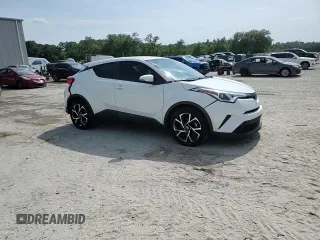 2019 Toyota C-HR XLE z VIN NMTKHMBX5KR079425, wystawiony jako Copart lot #57315345 z przebiegiem 109 441 mil mil oraz Szkoda całkowita • Salvage title. Historia ofert i sprzedaży dostępna na DreamBid. Obrazek 14.