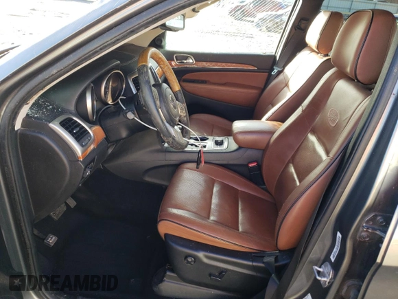 2013 Jeep Grand Cherokee Overland with VIN 1C4RJFCG0DC607214, listed as a Copart auction lot 43672575 with 188,026 mi miles and Salvage Title. Bid and sale history available at carsss.com. Image 7.