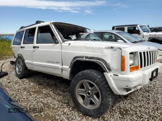 2000 Jeep Cherokee Classic с VIN 1J4FF58S7YL133399, выставлен на аукционе Copart как лот 61231845 с пробегом 196 499 миль миль и Списание • Salvage title. История ставок и продаж доступна на DreamBid. Изображение 4.