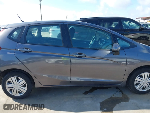 2020 Honda Fit LX with VIN 3HGGK5H46LM725764, listed as a IAAI auction lot 42499144 with 79,758 mi miles and . Bid and sale history available at DreamBid. Image 14.