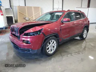 2014 Jeep Cherokee Latitude with VIN 1C4PJMCB0EW232554, listed as a Copart auction lot 82297764 with 102,623 mi miles and Salvage Title. Bid and sale history available at DreamBid. Image 1.