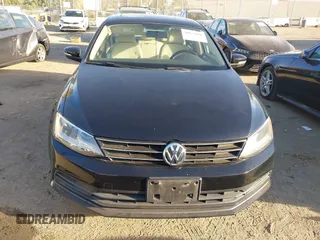 2015 Volkswagen Jetta Sedan 1.8T SE with VIN 3VWD17AJ3FM407697, listed as a IAAI auction lot 40659086 with 107,834 mi miles. Bid and sale history available at carsss.com. Image 12.