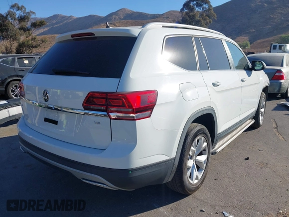2018 Volkswagen Atlas SE с VIN 1V2DR2CA9JC551484, выставлен на аукционе IAAI как лот 41262713 с пробегом 59 054 миль миль и . История ставок и продаж доступна на DreamBid. Изображение 4.