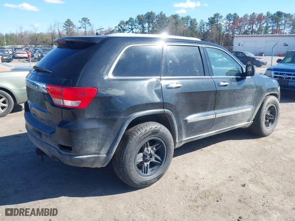 2011 Jeep Grand Cherokee Laredo with VIN 1J4RR4GG2BC585859, listed as a IAAI auction lot 41901919 with 272,585 mi miles. Bid and sale history available at carsss.com. Image 4.