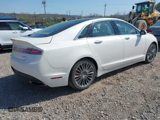 2014 Lincoln MKZ with VIN 3LN6L2J9XER808773, listed as a IAAI auction lot 42112712 with 105,832 mi miles. Bid and sale history available at carsss.com. Image 4.