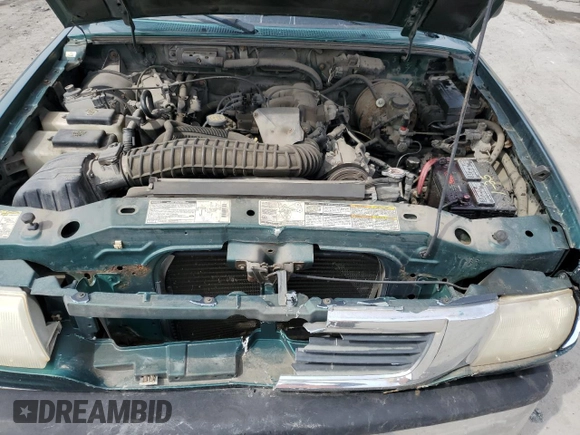 1999 Mazda B-Series Truck SE with VIN 4F4ZR17X2XTM25631, listed as a Copart auction lot 51625715 with 204,134 mi miles and Salvage Title. Bid and sale history available at DreamBid. Image 11.