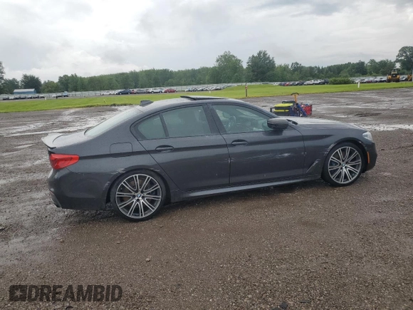 2020 BMW 5 Series M550i xDrive with VIN WBAJS7C06LCD12779, listed as a Copart auction lot 61136215 with 81,286 mi miles and Salvage title. Bid and sale history available at DreamBid. Image 3.