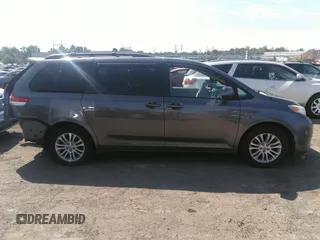 2014 Toyota Sienna XLE with VIN 5TDYK3DC2ES418860, listed as a IAAI auction lot 40139260 with 67,599 mi miles and . Bid and sale history available at DreamBid. Image 14.