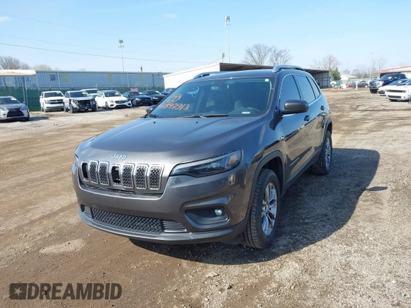 2019 Jeep Cherokee Latitude Plus with VIN 1C4PJMLBXKD162570, listed as a IAAI auction lot 41897313 with 142,110 mi miles. Bid and sale history available at carsss.com. Image 12.
