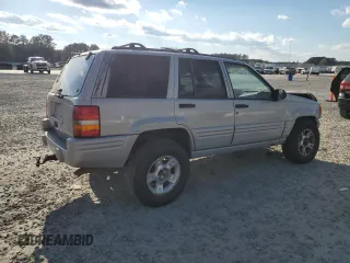 1998 Jeep Grand Cherokee with VIN 1J4GX48Y7WC216585, listed as a Copart auction lot 83532184 with 144,739 mi miles and Salvage title. Bid and sale history available at DreamBid. Image 3.