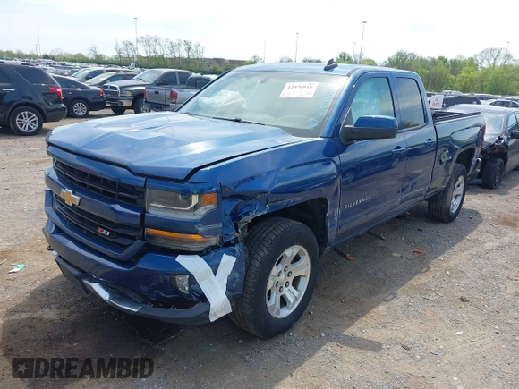 2018 Chevrolet Silverado 1500 LT with VIN 1GCVKREC9JZ123333, listed as a IAAI auction lot 42070916 with 142,814 mi miles and . Bid and sale history available at DreamBid. Image 2.