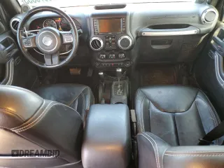 2014 Jeep Wrangler Unlimited Sahara with VIN 1C4BJWEG1EL107711, listed as a Copart auction lot 46976855 with 0 mi miles and Salvage Title. Bid and sale history available at carsss.com. Image 8.
