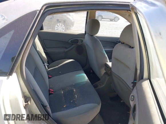 2003 Ford Focus SE z VIN 1FAFP34Z23W257426, wystawiony jako IAAI lot #40736207 z przebiegiem 87 447 mil mil oraz . Historia ofert i sprzedaży dostępna na DreamBid. Obrazek 8.