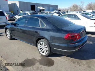 2019 Volkswagen Passat 2.0T Wolfsburg Edition with VIN 1VWLA7A32KC012841, listed as a IAAI auction lot 41539683 with 75,897 mi miles. Bid and sale history available at carsss.com. Image 3.