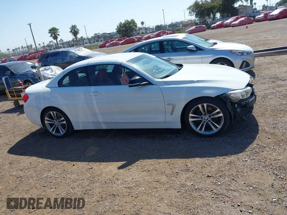 2015 BMW 4 Series 428i z VIN WBA3V7C58FP771642, wystawiony jako IAAI lot #42524828 z przebiegiem 64 440 mil mil oraz . Historia ofert i sprzedaży dostępna na DreamBid. Obrazek 14.