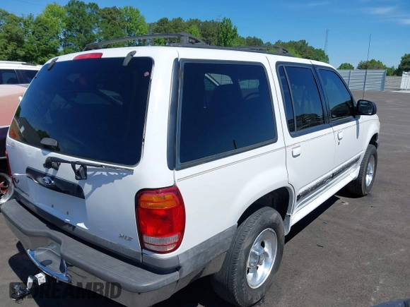 2000 Ford Explorer XLT z VIN 1FMZU63E3YUB34927, wystawiony jako IAAI lot #42208468 z przebiegiem 230 508 mil mil oraz . Historia ofert i sprzedaży dostępna na DreamBid. Obrazek 4.
