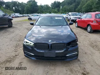 2020 BMW 5 Series with VIN WBAJB1C03LCD19170, listed as a Copart auction lot 64942594 with 66,584 mi miles and Salvage title. Bid and sale history available at DreamBid. Image 5.