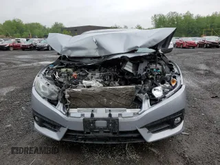 2017 Honda Civic EX-L z VIN 19XFC1F74HE209787, wystawiony jako Copart lot #56352415 z przebiegiem 130 264 mil mil oraz Szkoda całkowita • Salvage title. Historia ofert i sprzedaży dostępna na DreamBid. Obrazek 5.