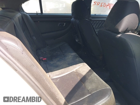 2013 Ford Police Interceptor with VIN 1FAHP2M80DG205024, listed as a IAAI auction lot 42740282 with 123,705 mi miles and . Bid and sale history available at DreamBid. Image 8.