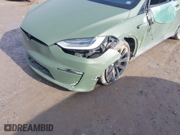 2022 Tesla Model X Plaid z VIN 7SAXCBE6XNF358023, wystawiony jako IAAI lot #41683857 z przebiegiem 42 821 mil mil oraz . Historia ofert i sprzedaży dostępna na DreamBid. Obrazek 22.