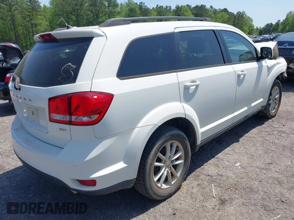 2013 Dodge Journey SXT with VIN 3C4PDCBG0DT701712, listed as a IAAI auction lot 42015263 with 92,533 mi miles. Bid and sale history available at carsss.com. Image 4.