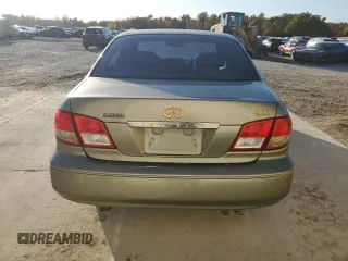 2002 Infiniti I35 Luxury with VIN JNKDA31A62T014458, listed as a Copart auction lot 77677764 with 169,007 mi miles and Salvage Title. Bid and sale history available at DreamBid. Image 6.