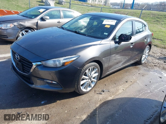 2017 Mazda 3 Touring with VIN 3MZBN1L70HM102817, listed as a IAAI auction lot 41867063 with 100,307 mi miles and . Bid and sale history available at DreamBid. Image 18.