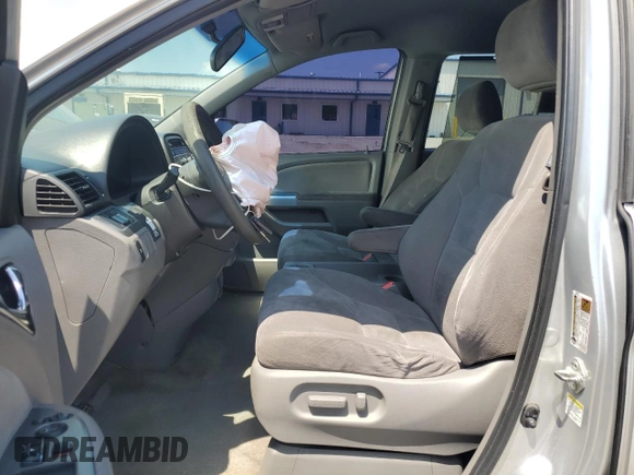 2010 Honda Odyssey EX with VIN 5FNRL3H47AB022393, listed as a Copart auction lot 61956845 with 317,023 mi miles and Salvage title. Bid and sale history available at DreamBid. Image 7.