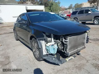 2014 Kia Optima Hybrid EX with VIN KNAGN4ADXE5069035, listed as a IAAI auction lot 41730332 with 194,627 mi miles. Bid and sale history available at carsss.com. Image 1.