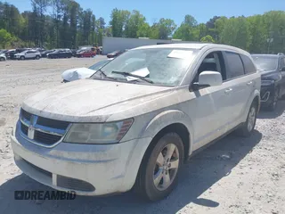 2009 Dodge Journey SXT with VIN 3D4GG57VX9T200489, listed as a IAAI auction lot 42048965 with 156,830 mi miles. Bid and sale history available at carsss.com. Image 2.
